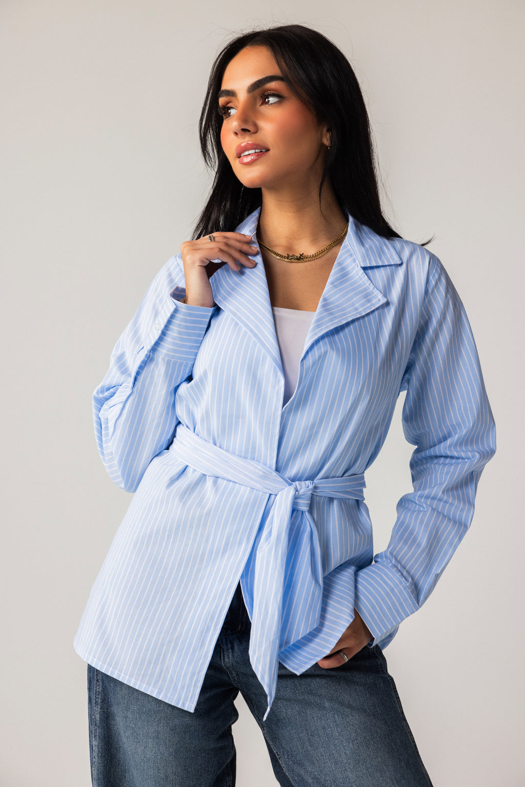 Striped shirt with a tie at the waist