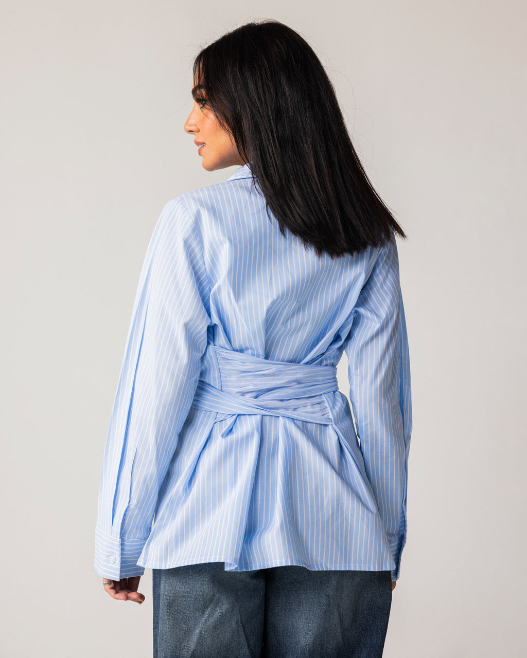 Striped shirt with a tie at the waist