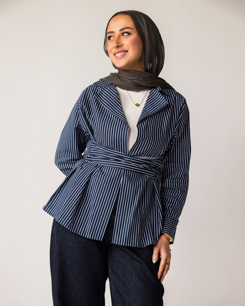Striped shirt with a tie at the waist