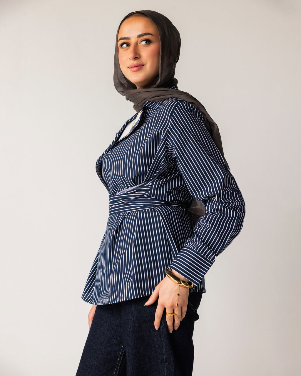 Striped shirt with a tie at the waist