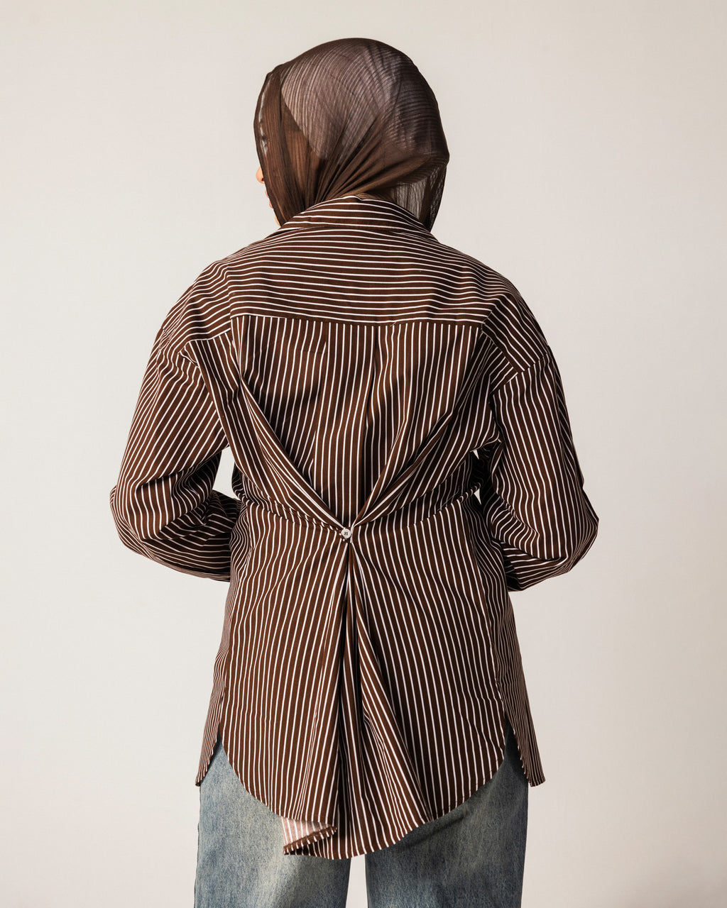 Oversized shirt with buttons down the back