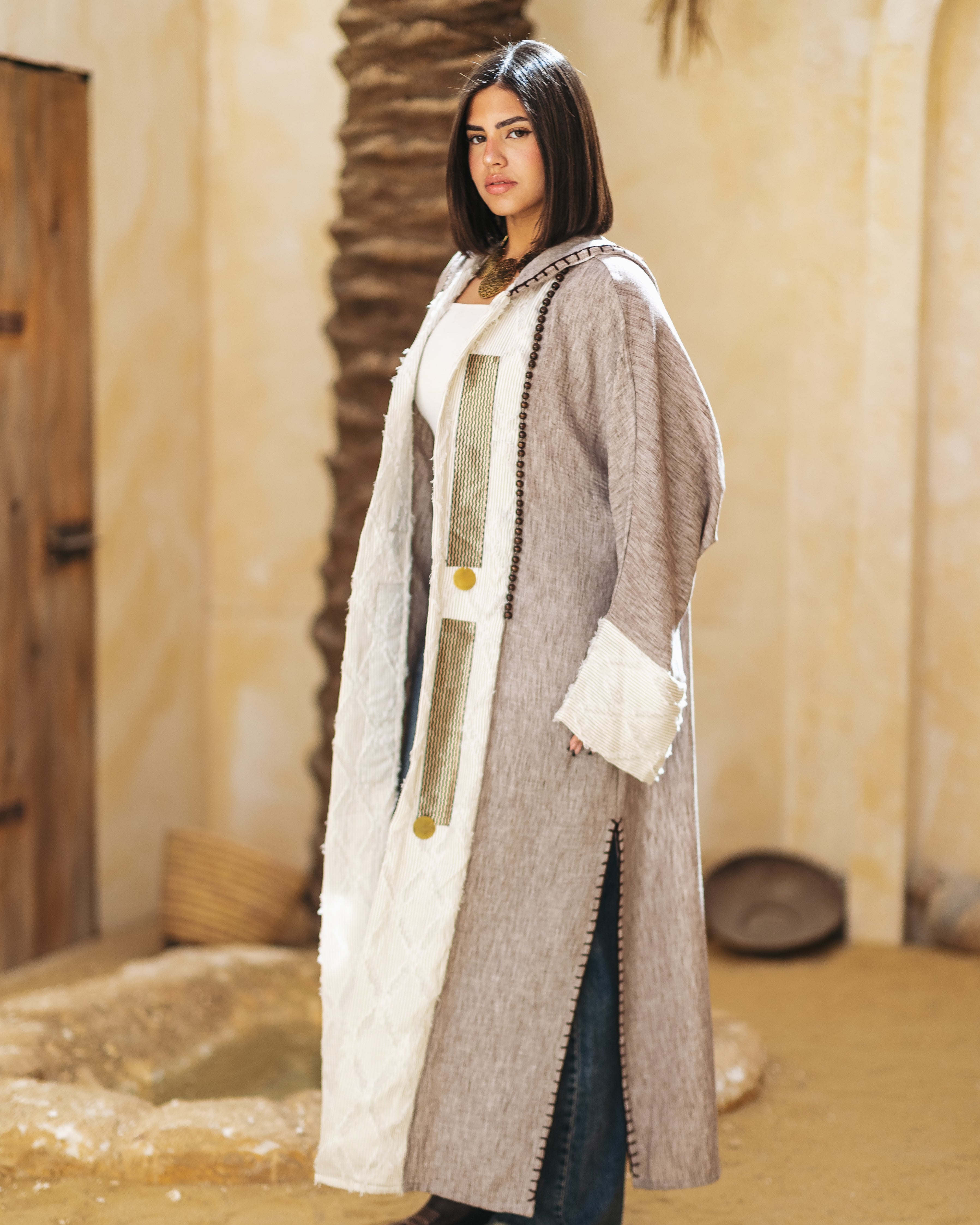 A hooded linen kaftan designed for comfort and style