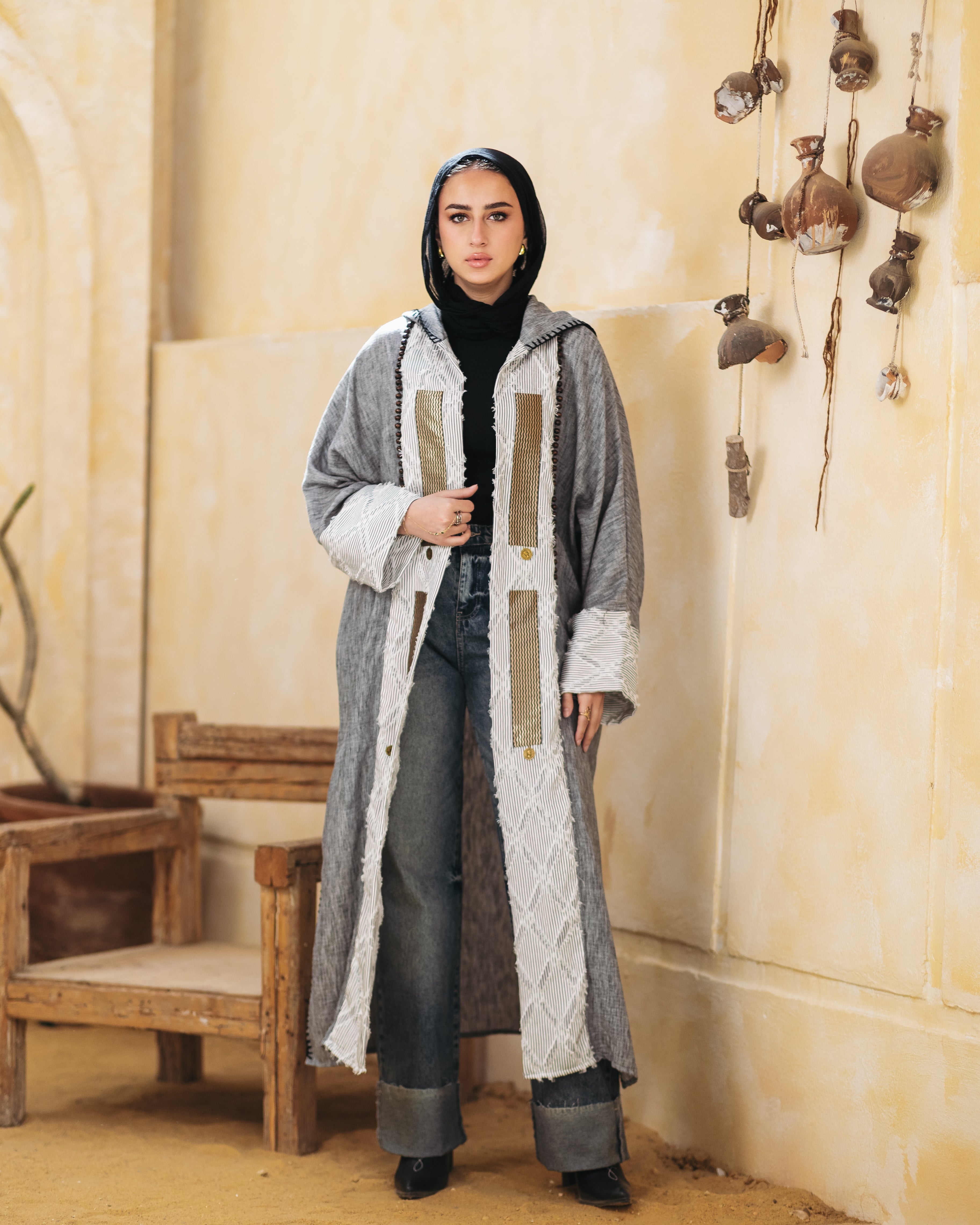 A hooded linen kaftan designed for comfort and style