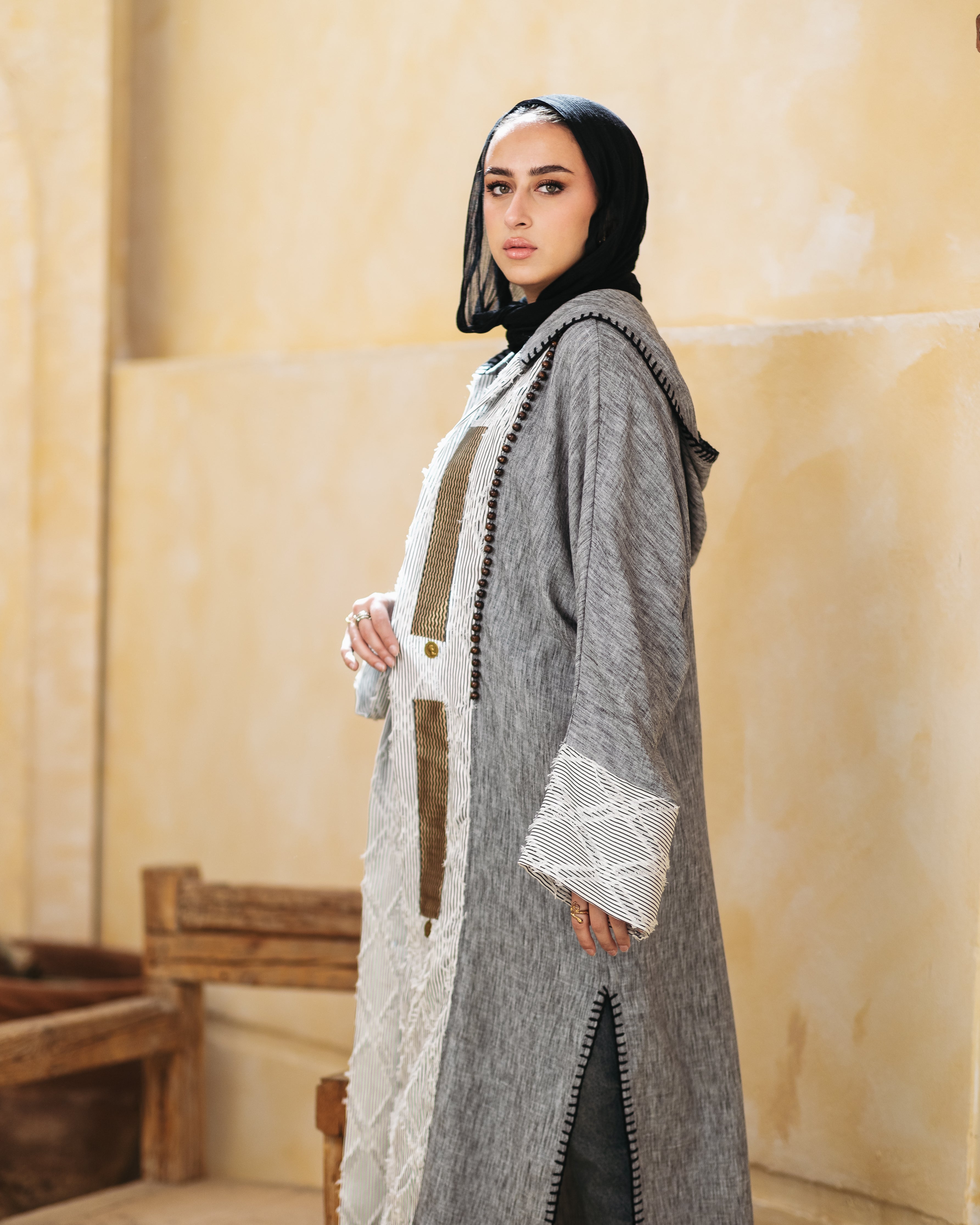 A hooded linen kaftan designed for comfort and style