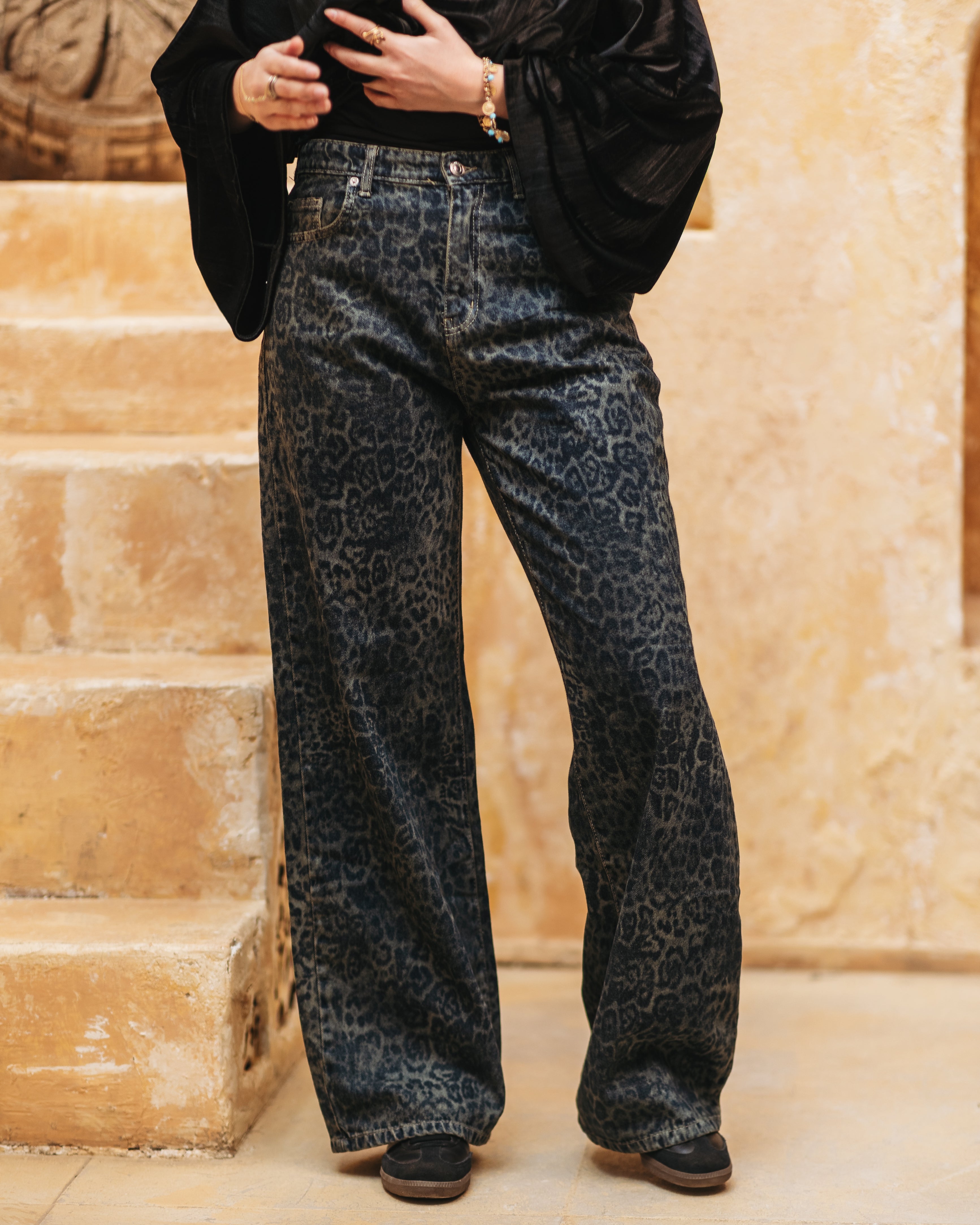 Tiger-print denim pants with a bold fit