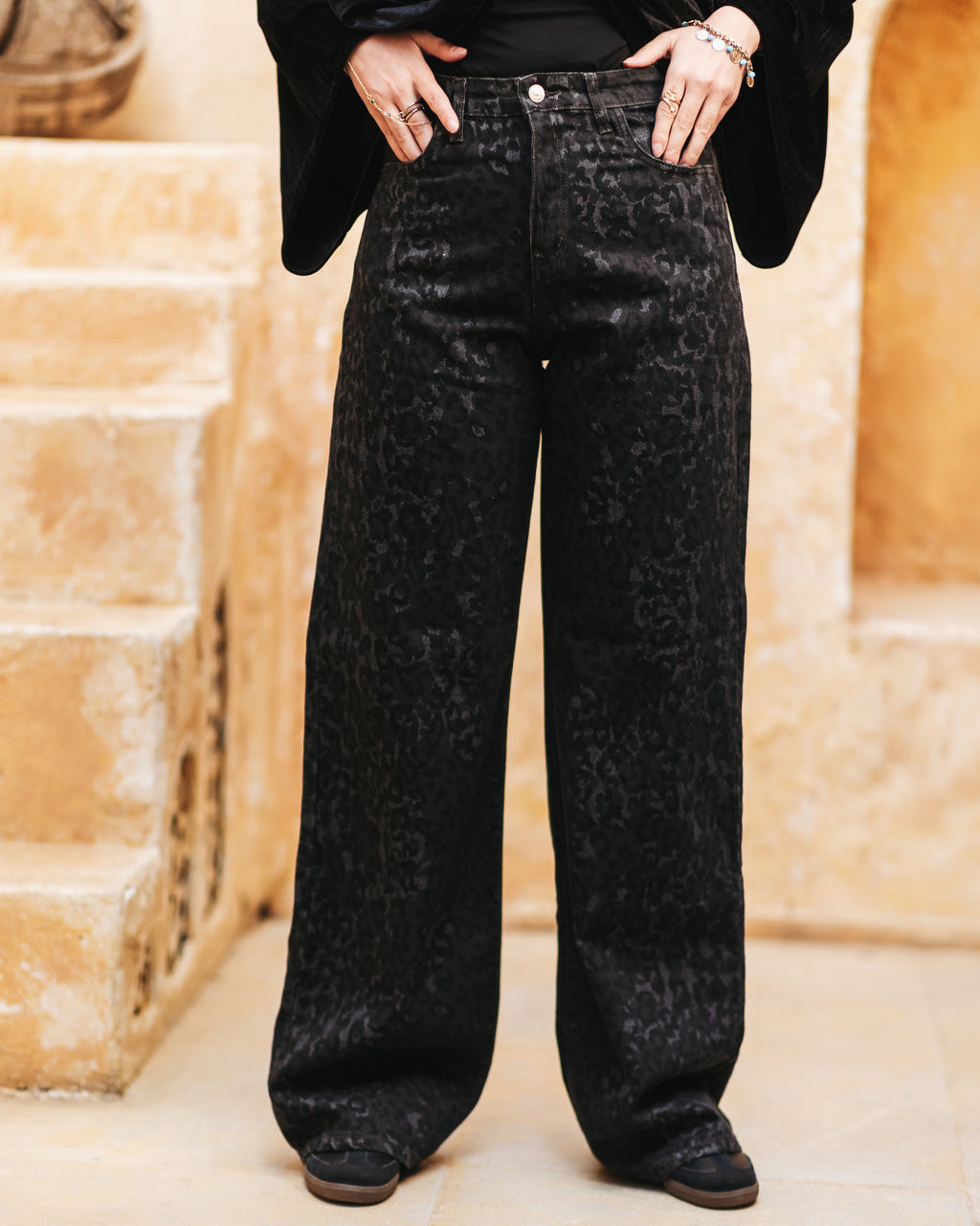 Tiger-print denim pants with a bold fit
