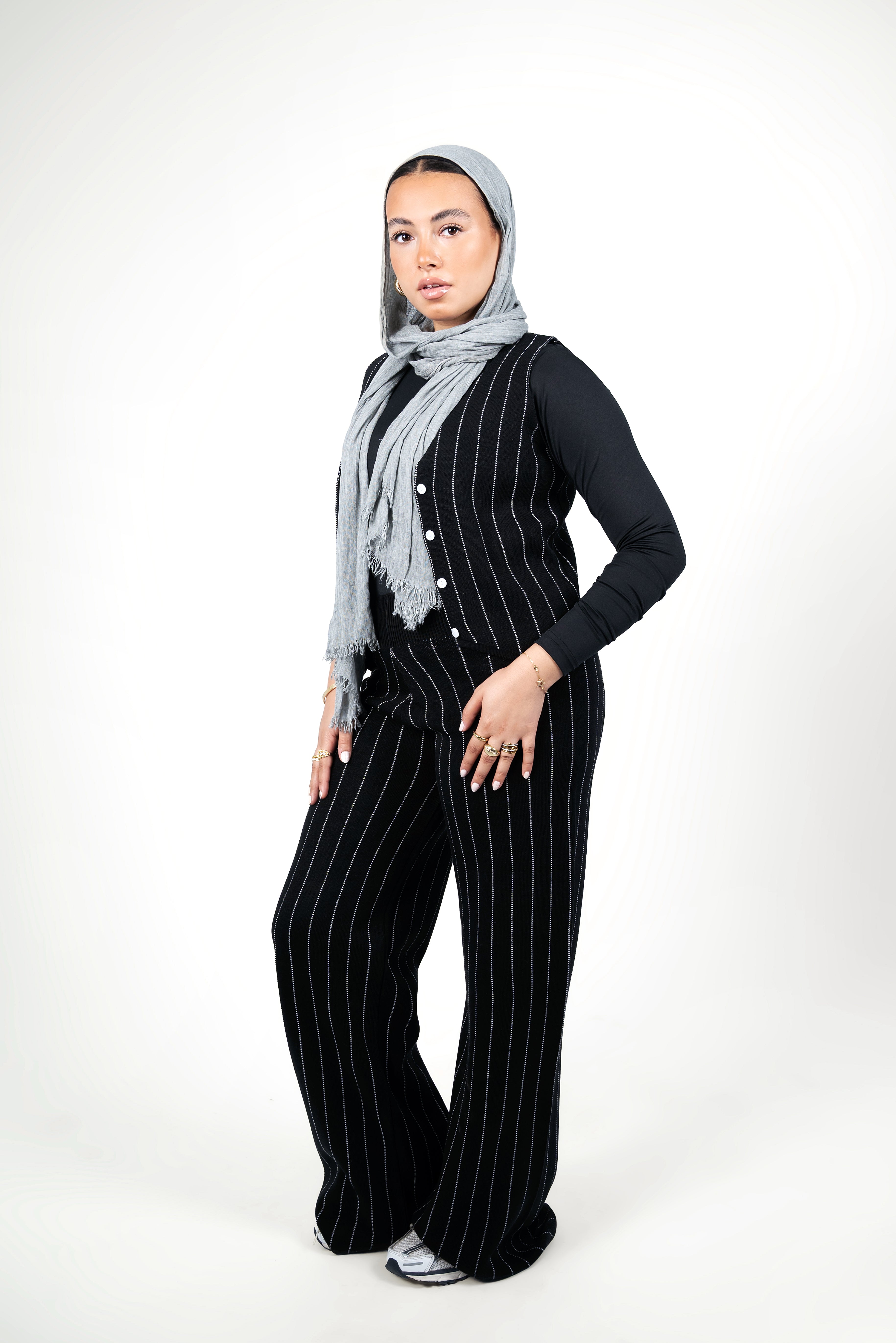 A sleek black pinstriped sleeveless set - Black