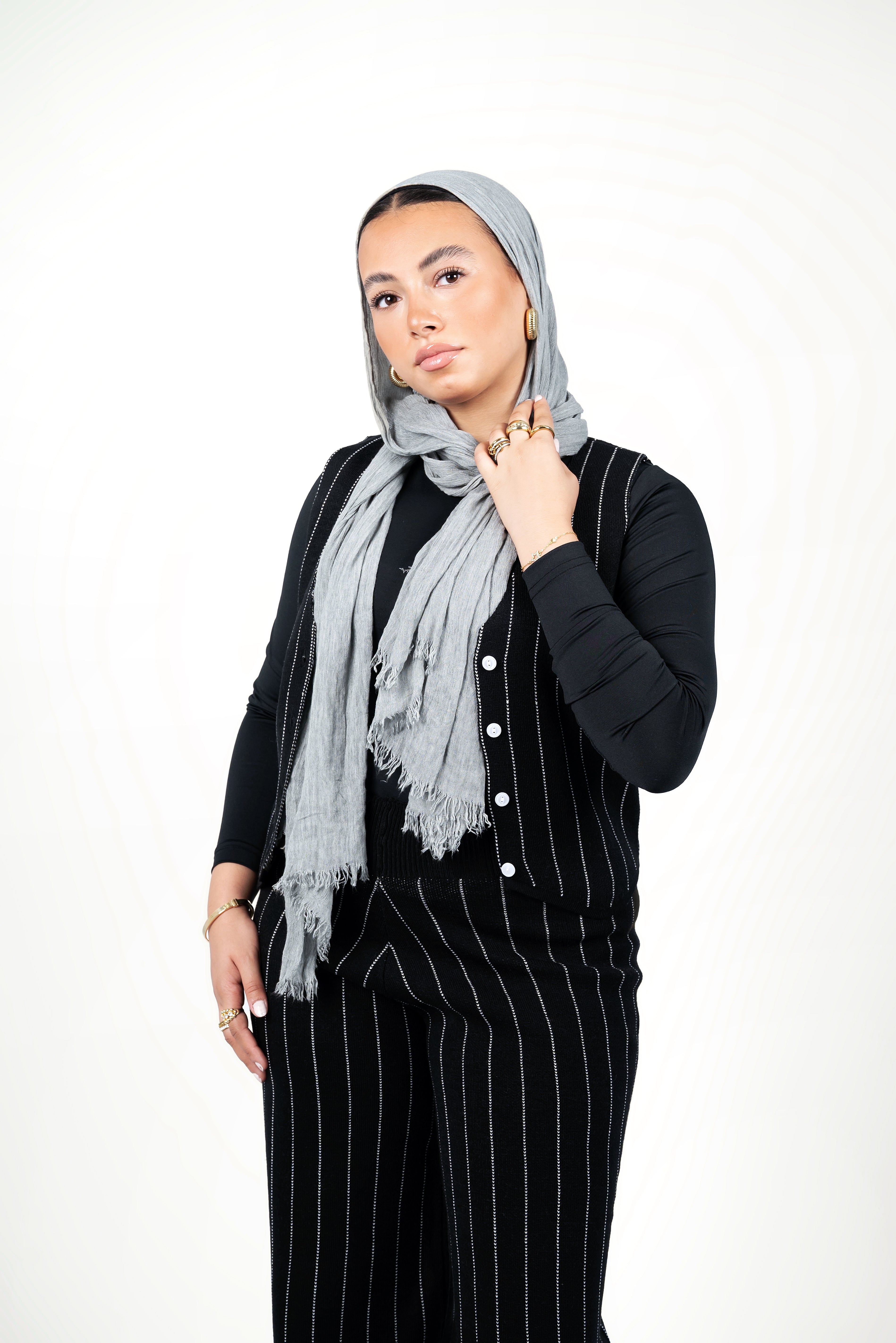 A sleek black pinstriped sleeveless set - Black