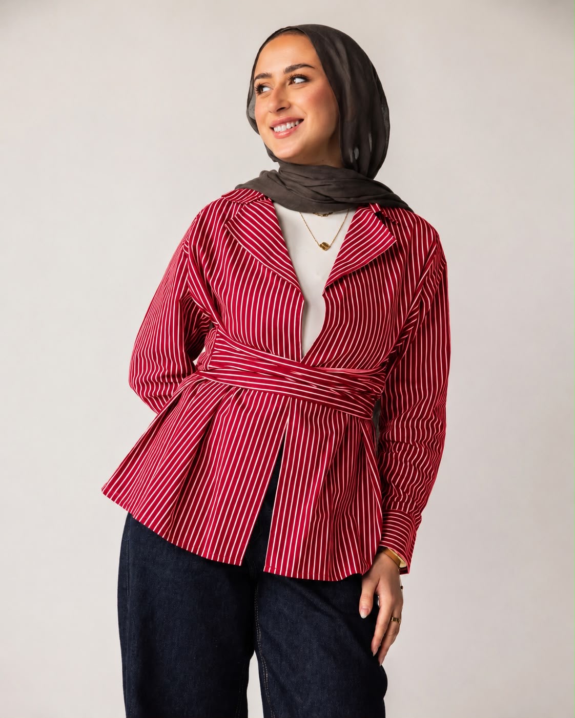 Striped shirt with a tie at the waist