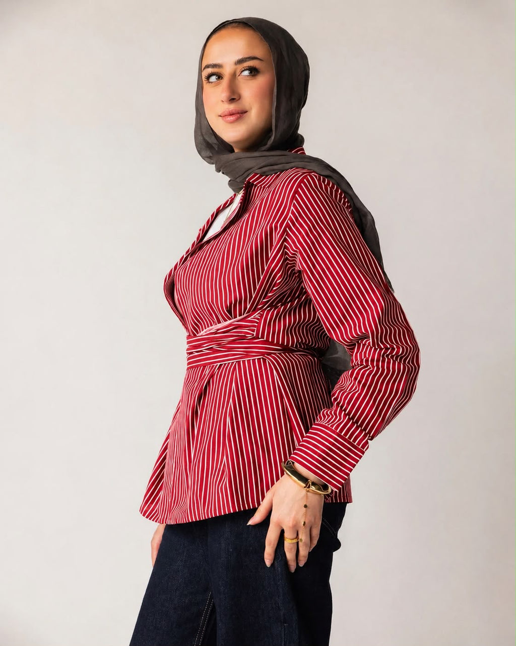 Striped shirt with a tie at the waist
