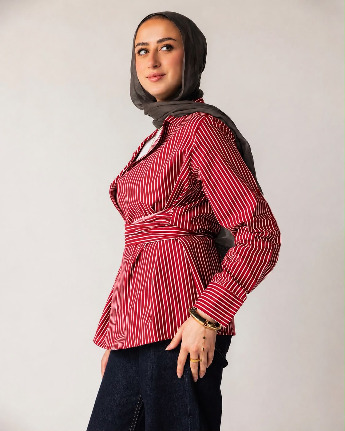 Striped shirt with a tie at the waist