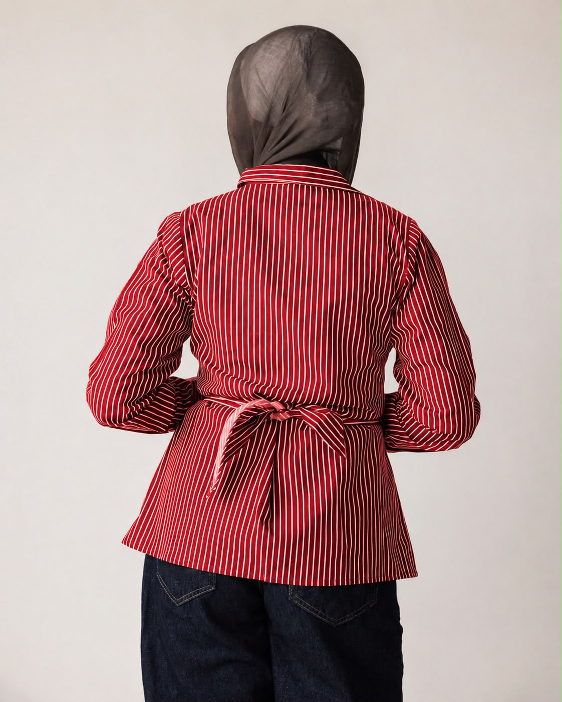 Striped shirt with a tie at the waist