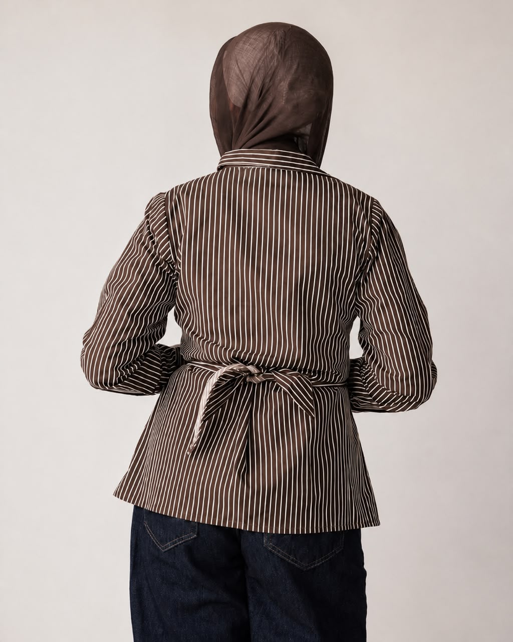 Striped shirt with a tie at the waist