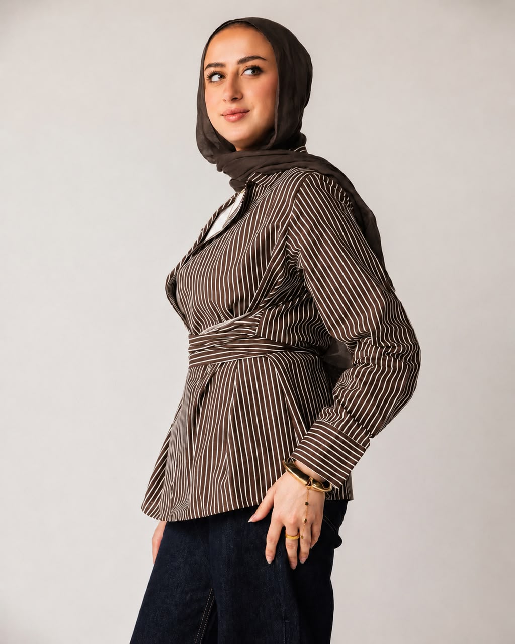 Striped shirt with a tie at the waist