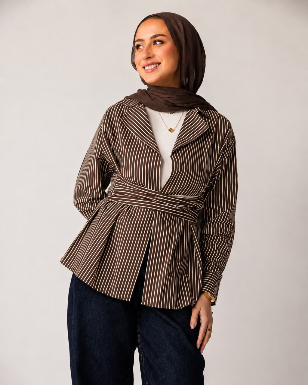 Striped shirt with a tie at the waist